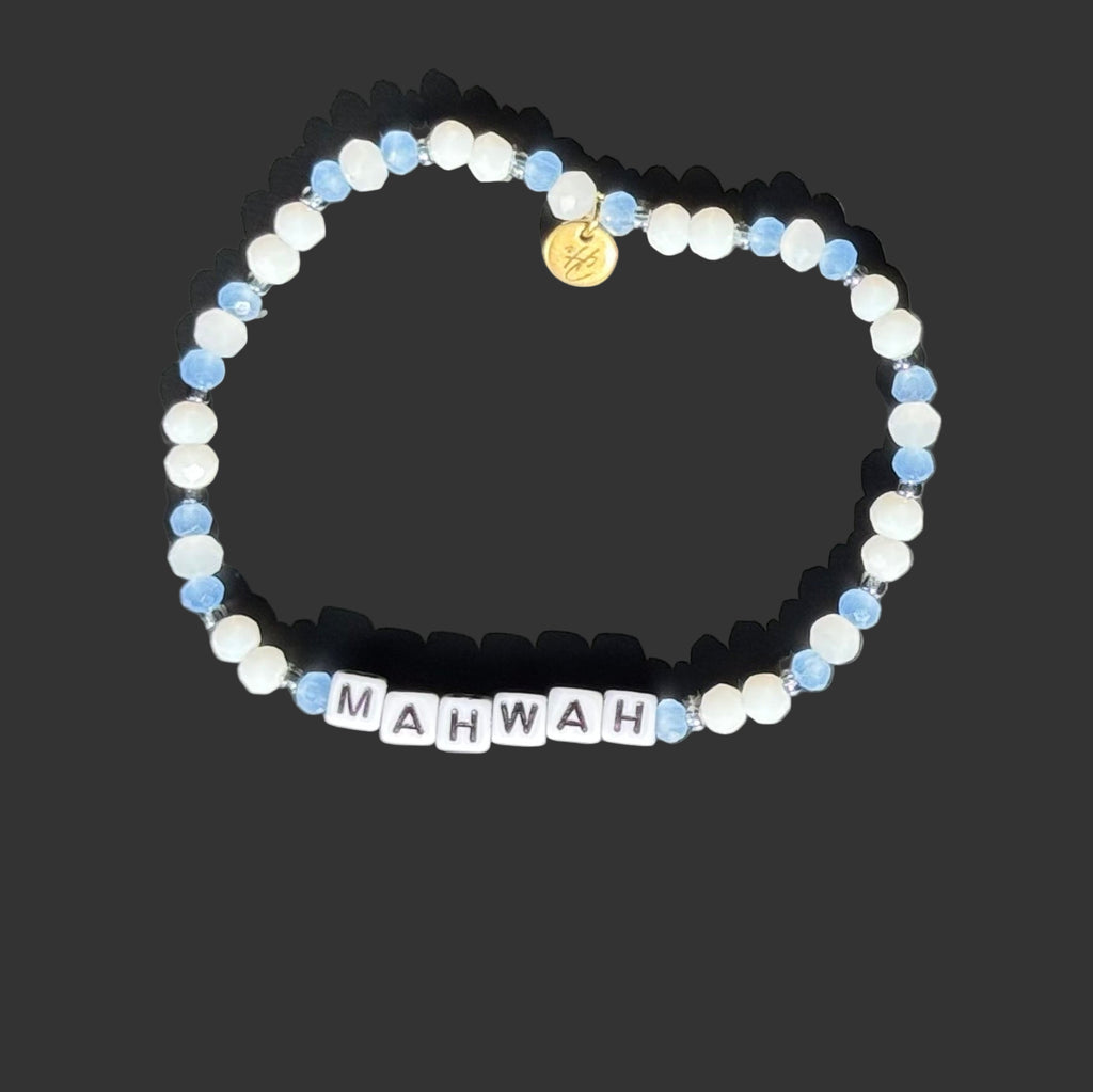Beaded bracelet with 'MAHWAH' beads on a dark background