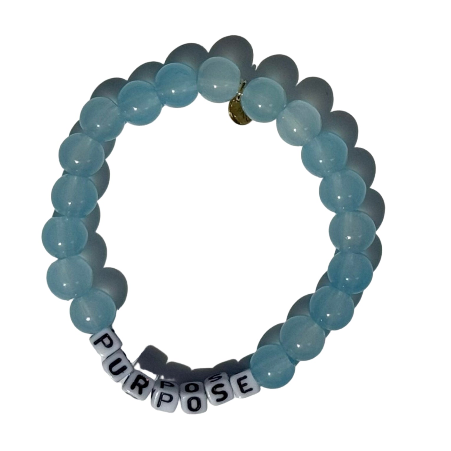 Blue beaded bracelet with 'PURPOSE' charm on a white background